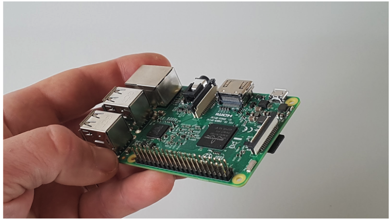 The unclipped clip/hinge on the Raspberry Pi camera cable connector